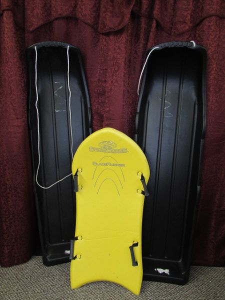 SNOW BOOGIE BOARD AND TWO TOBOGGANS