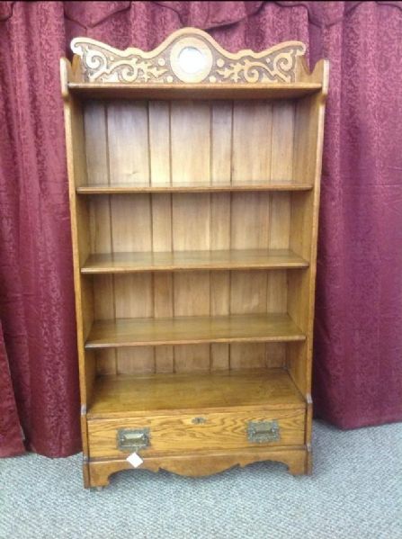 ANTIQUE OAK BOOKCASE WITH CARVED TOP, BEVELED MIRROR & DRAWER 