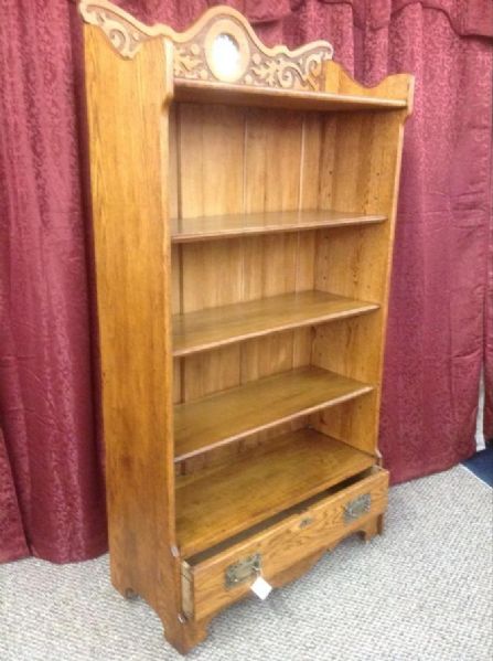 ANTIQUE OAK BOOKCASE WITH CARVED TOP, BEVELED MIRROR & DRAWER 