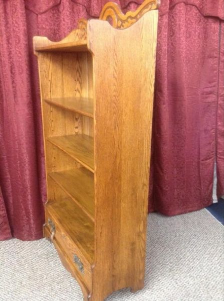 ANTIQUE OAK BOOKCASE WITH CARVED TOP, BEVELED MIRROR & DRAWER 