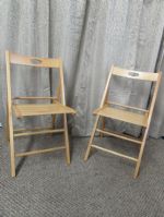 TWO WOOD FOLDING PATIO CHAIRS