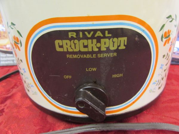 RIVAL CROCK POT WITH TWO HARDBACK COOK BOOKS.