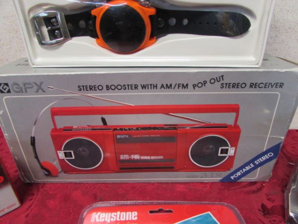 STEREO RADIO, ROCK STRAP RADIO, BABY BEN CLOCK, SANYO RADIO AND 110 CAMERA