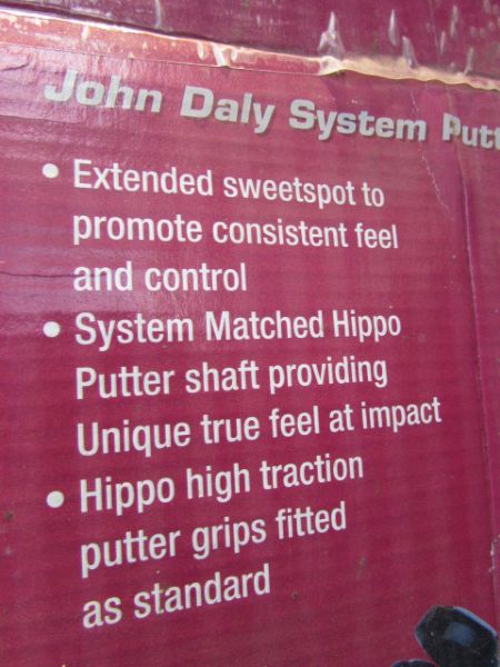 NEVER USED SET OF HIPPO GOLF CLUBS