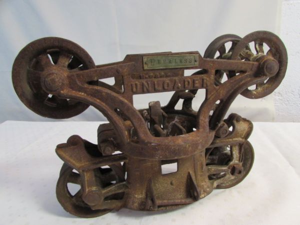 ANTIQUE CAST IRON HAY TROLLEY