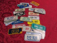 COLLECTION OF MINIATURE METAL LICENSE PLATES