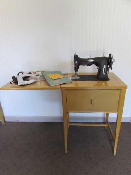 VINTAGE WHITE SEWING MACHINE IN CABINET