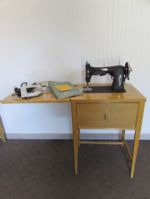 VINTAGE WHITE SEWING MACHINE IN CABINET