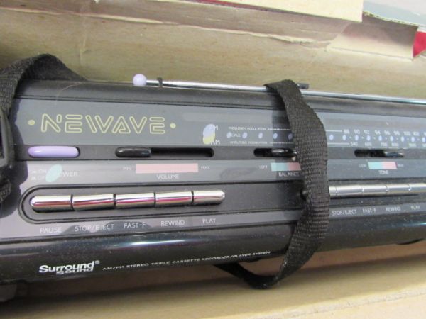 UNUSED IN THE ORIGINAL BOX NEWAVE RADIO/TRIPLE CASSETTE PLAYER