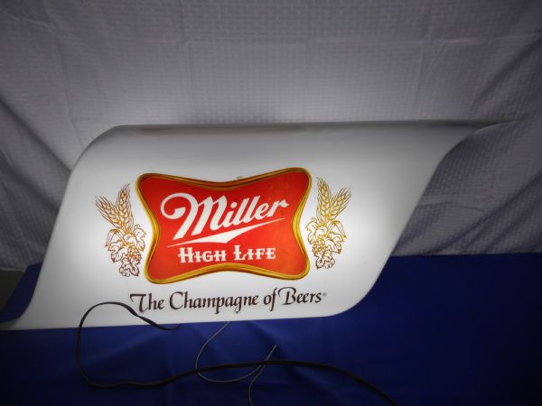 MAN CAVE MILLER BAR LIGHT.