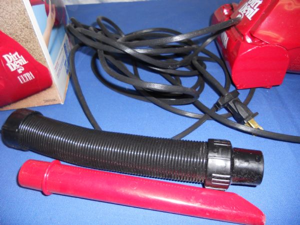 SLIGHTLY USED DIRT DEVIL VACCUM.