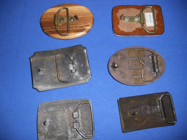 SIX COLLECTABLE BELT BUCKLES