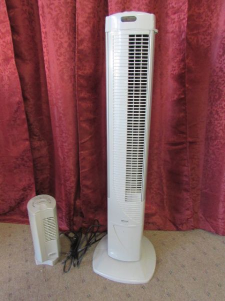 TWO OSCILLATING TOWER FANS