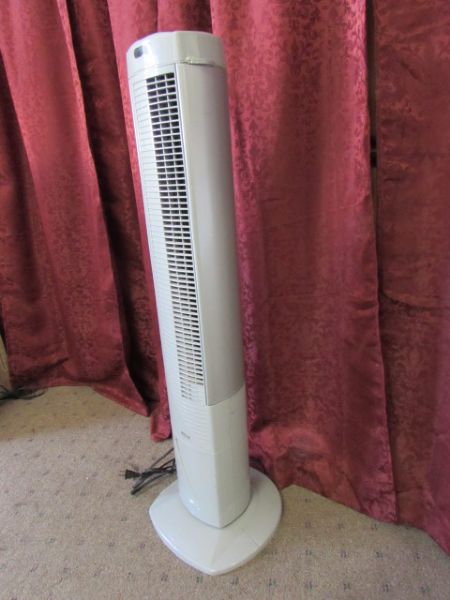 TWO OSCILLATING TOWER FANS