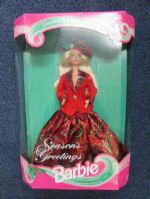 1994 LIMITED EDITION SEASONS GREETINGS BARBIE WEARING A PRETTY GREEN & RED GOWN