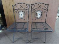 WROUGHT IRON PATIO CHAIRS WITH MOSAIC TILE INLAY.