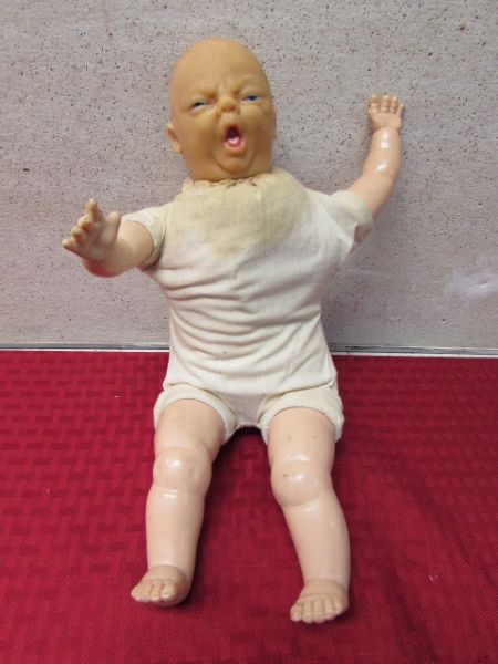 CIRCA 1930'S SQUALLING BABY DOLL