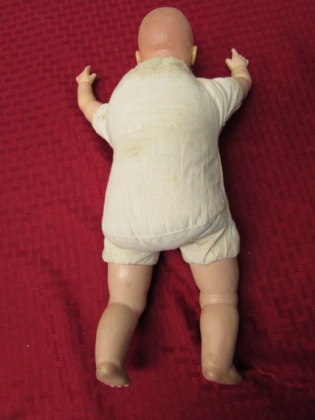 CIRCA 1930'S SQUALLING BABY DOLL