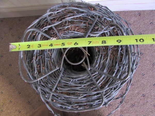 LARGE SPOOL OF BARBED WIRE