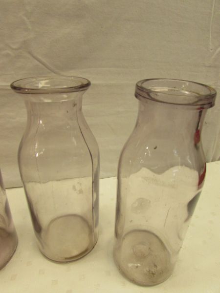 FOUR LOVELY ANTIQUE AMETHYST GLASS MILK BOTTLES