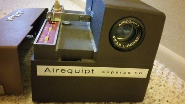 SLIDE PROJECTOR AND PORTABLE SCREEN