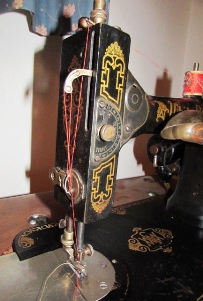 ANTIQUE WHITE SEWING MACHINE WITH CABINET