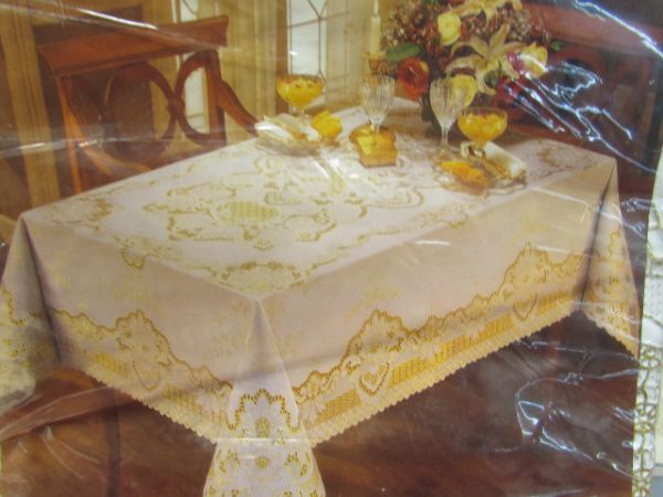 FIVE NEVER USED PLASTIC TABLECLOTHS