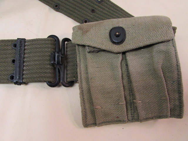 Lot Detail - VINTAGE MILTARY WEB BELT WITH 1ST AID KIT & AMMO POUC