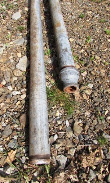 TWO TWENTY FOOT LONG GALVANIZED PIPES