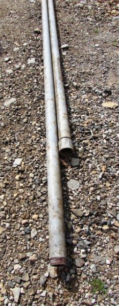 TWO TWENTY FOOT LONG GALVANIZED PIPES