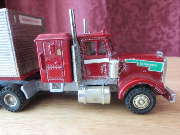 TWO SHINSEI MINI POWER TOY SEMI TRUCKS WITH TRAILERS