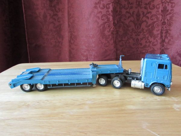 TWO SHINSEI MINI POWER TOY SEMI TRUCKS WITH TRAILERS