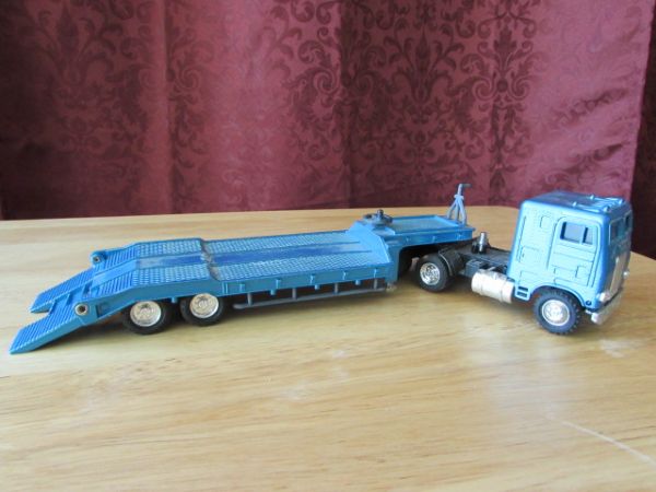 TWO SHINSEI MINI POWER TOY SEMI TRUCKS WITH TRAILERS