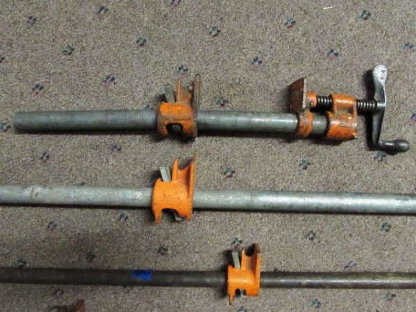 FOUR PIPE CLAMPS