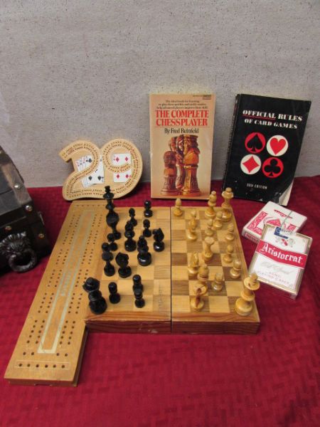 A TREASURE CHEST, CRIBBAGE GAMES, WOOD CHESS SET & MORE