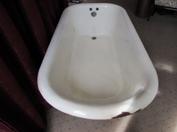 CLAW FOOT BATHTUB WITH VINTAGE FAUCETS