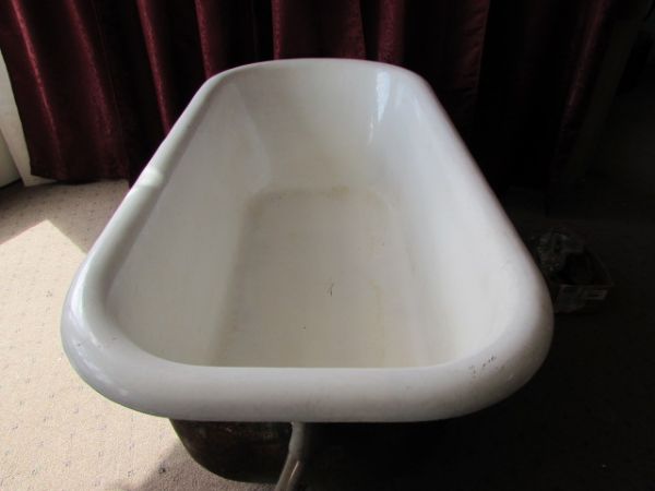 CLAW FOOT BATHTUB WITH VINTAGE FAUCETS