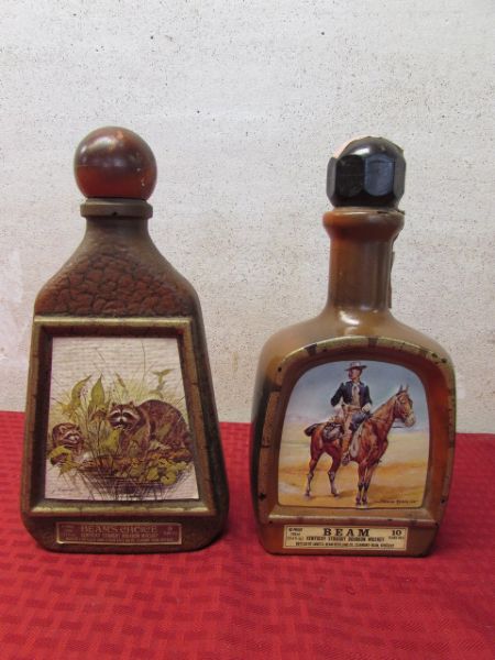 TWO VINTAGE JIM BEAM WHISKEY BOTTLES, FREDERICK REMINGTON & RACCOONS