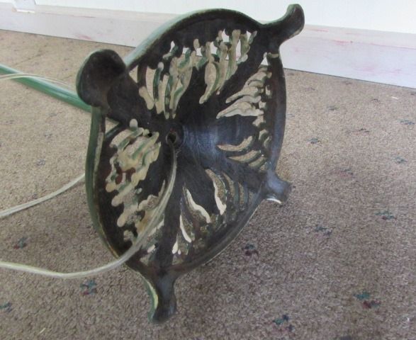 ANTIQUE FLOOR LAMP WITH ORNATELY SCUPTED METAL BASE