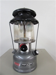 VERY NICE COLEMAN DUAL FUEL LANTERN &  CAN OF FUEL