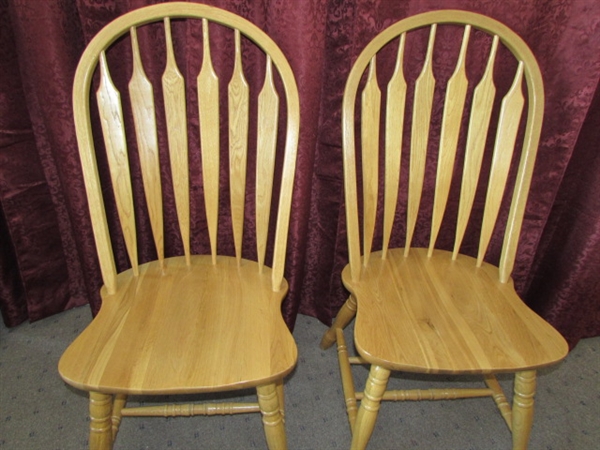 TWO PRETTY OAK ARROW BACK DINING CHAIRS