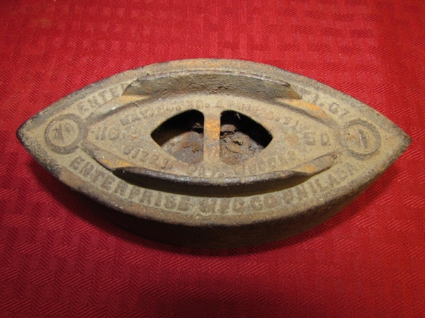 TWO ANTIQUE FLAT IRONS, ONE WITH WOOD HANDLE