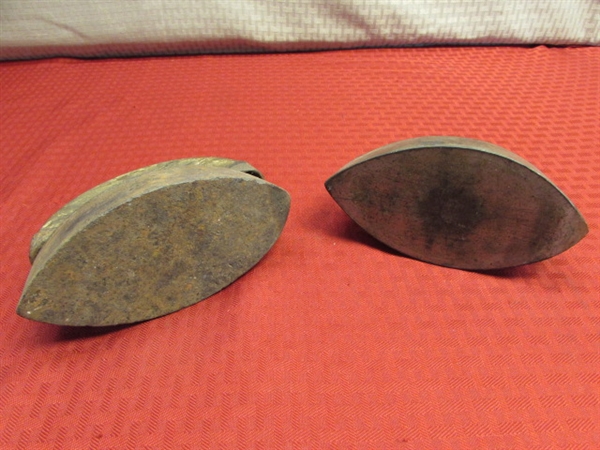 TWO ANTIQUE FLAT IRONS, ONE WITH WOOD HANDLE