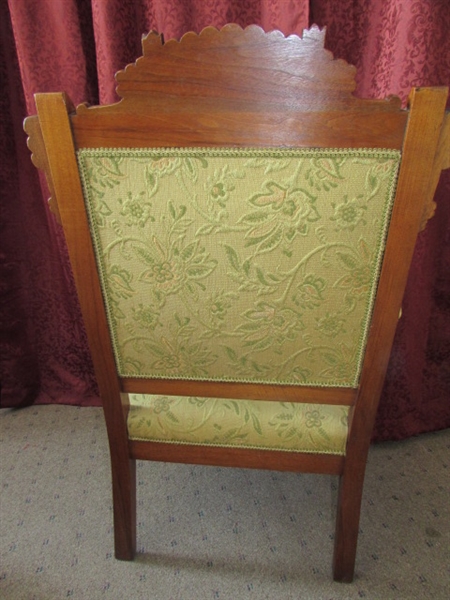 ANTIQUE UPHOLSTERED CARVED WOOD ARM CHAIR