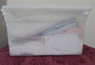 PLASTIC STORAGE TOTE FULL OF USED SHEETS, PILLOW CASES & MORE