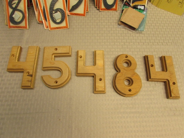 DOZENS OF NEW IN PACKAGE HOUSE NUMBERS, STENCILS & SOME WOOD NUMBERS