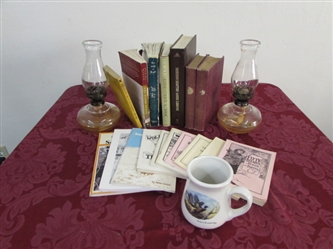 CABIN FEVER CURE & DÉCOR- TWO 10" OIL LAMPS, HUNTING & ADVENTURE BOOKS & COCOA MUG
