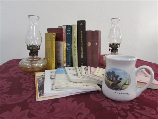 CABIN FEVER CURE & DÉCOR- TWO 10 OIL LAMPS, HUNTING & ADVENTURE BOOKS & COCOA MUG