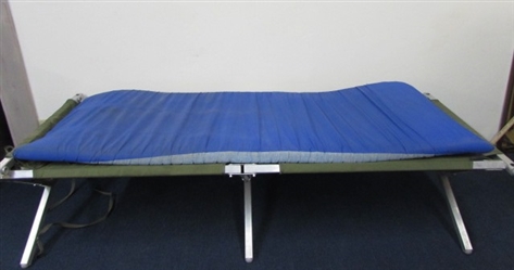SLEEP IN COMFORT WITH THIS CAMPING COT AND COMFY SLEEPING PAD.