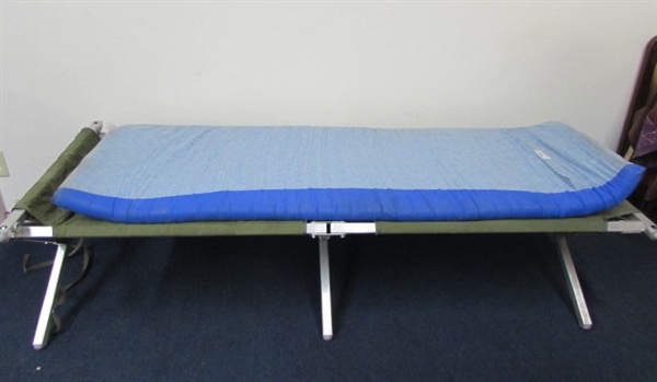 SLEEP IN COMFORT WITH THIS CAMPING COT AND COMFY SLEEPING PAD.